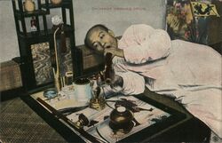 Chinaman Smoking Opium Postcard