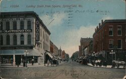 Globe Clothing Co., Springfield, MO - Looking South Postcard