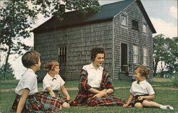 Family in Plaid Skirts at the Loomcrofter's Studio 