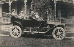 Family in Automobile Postcard