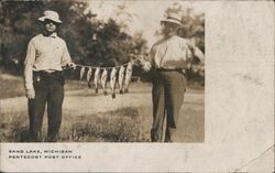 Couple Holding String of Fish, Sand Lake, Michigan Postcard Postcard Postcard