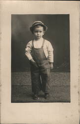 Boy in Overalls and Hat Postcard