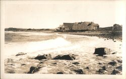 Ocean Waves Crashing on Rocky Beach, Houses Postcard