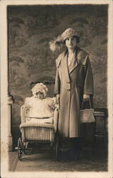 Woman with Baby in Wicker Carriage Postcard