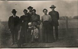 Family Portrait Reflected in a Puddle Postcard