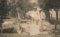 Two Men with Bags of Lime and Stone Postcard