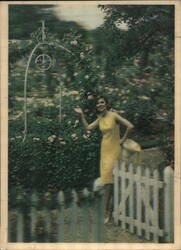 Woman in Yellow Dress in Garden Postcard