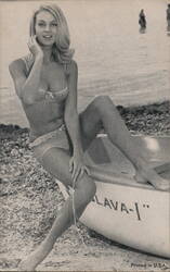 Blonde Woman in Bikini Sitting on Boat Named "Slava" Swimsuits & Pinup Arcade Card Arcade Card Arcade Card