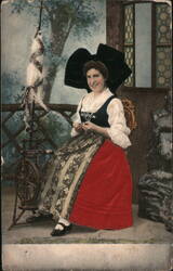 Woman in Traditional Dutch Costume with Spinning Wheel Postcard