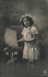 Girl with Bonne Fete Sign Postcard