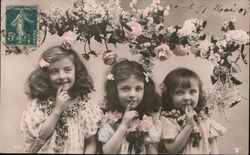 Three Girls with Flowers, Fingers on Lips Postcard