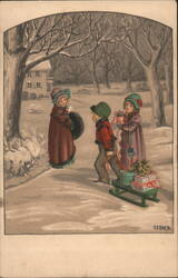 Children with Christmas Gifts and Sled in Snowy Landscape Postcard