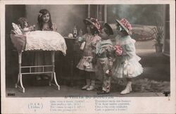 A Visita do Douctor - Children Visiting a Doll in a Cradle Postcard