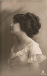 Young Woman with Elaborate Hairstyle, Head Tilted Postcard