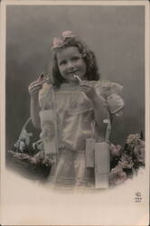 Young Girl with Gifts and Candy Cigarettes Girls Postcard Postcard Postcard