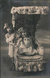 Two Girls with Wicker Chair, Vintage Real Photo Postcard Postcard