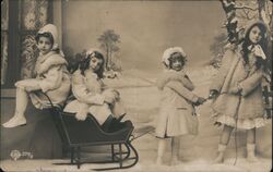 Four Girls in Winter Coats with Sled Postcard