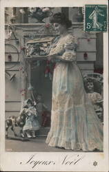 Woman in Gown with Box of Toys, Dolls, Rocking Horse, Joyeux Noel Postcard