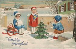 Three Dutch Children Celebrate Christmas with Small Decorated Tree Postcard