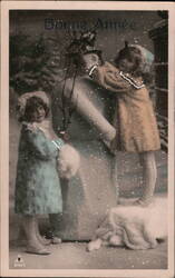 Bonne Annee, Two Girls Building a Snowman Postcard