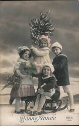 Four Children with Christmas Tree and Gifts, Bonne Année Postcard