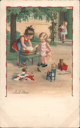 Two Little Girls Washing Doll Clothes Postcard