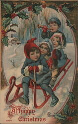 A Happy Christmas - Children Sledding Postcard