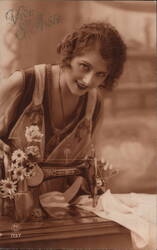 French Woman Sewing, Vintage Postcard, c. 1920s Postcard