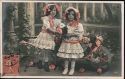 Two Girls with Wheelbarrow of Flowers, France - Colorized Vintage Postcard Children Postcard Postcard