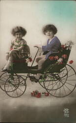 Two Children in Flower-Adorned Pedal Car, Antique Postcard Postcard Postcard