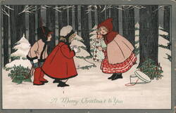 Children Exchanging Gifts in Snowy Woods Christmas Postcard