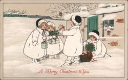 Four Children in White Coats Exchanging Christmas Gifts in the Snow Pauli Ebner Postcard Postcard Postcard