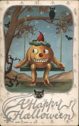 Happy Halloween Pumpkin Figure on Swing with Black Cats Postcard