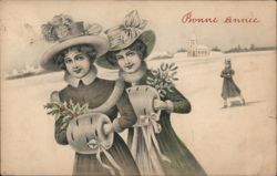 Bonne Année: Two Women with Holly and Mistletoe, Ice Skater in Background Beautiful Ladies Postcard Postcard Postcard