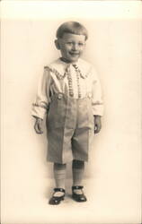 Smiling Boy in Ruffled Shirt and Suspender Shorts Children Postcard Postcard Postcard