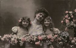 Mother with Two Daughters and Flowers Postcard