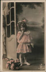 Little Girl with Floral Headpiece and Roses by Door Postcard