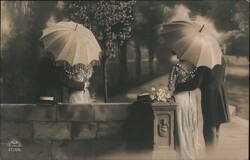 Romantic Couples with Parasols in a Park Postcard