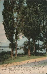 Glimpse of Chautauqua Lake, NY - Lush Trees and Lakeside Gazebo Postcard