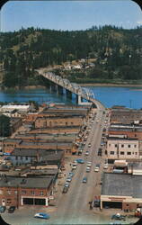 Bonners Ferry, Idaho Main Street and Kootenai River Bridge Postcard