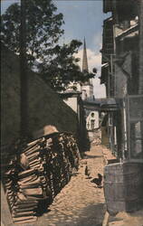 Cobblestone Street Scene with Woodpile, Tallinn, Estonia Postcard