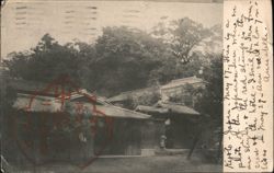 Japanese Home with Tiled Roof and Woman in Traditional Dress Postcard