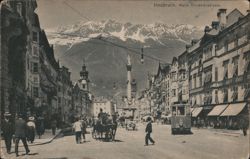 Innsbruck Maria Theresienstrasse with Tram, Horse Carriages & Alps Postcard