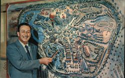 Walt Disney points to Adventureland at Disneyland Postcard