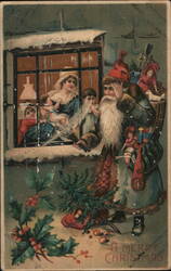 Santa Claus Outside Window with Family Inside Postcard