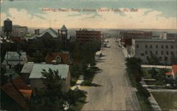 Looking South, Kelly Avenue, Devils Lake, ND Postcard