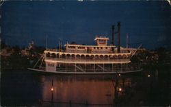 Mark Twain Riverboat at Disneyland at Night Postcard