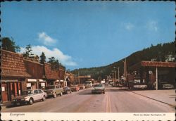 Looking South on Highway 74 in Evergreen, Colorado Postcard