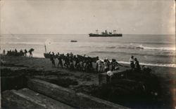 Men Pulling Boat Ashore Postcard