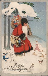 Santa Claus wearing a red and black coat with black hat delivering toys on foot in the snow Postcard